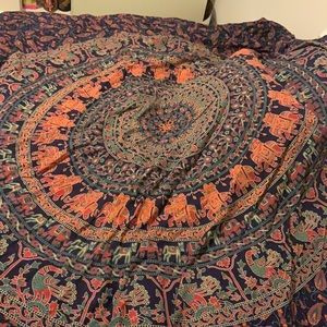 blue and orange elephant tapestry